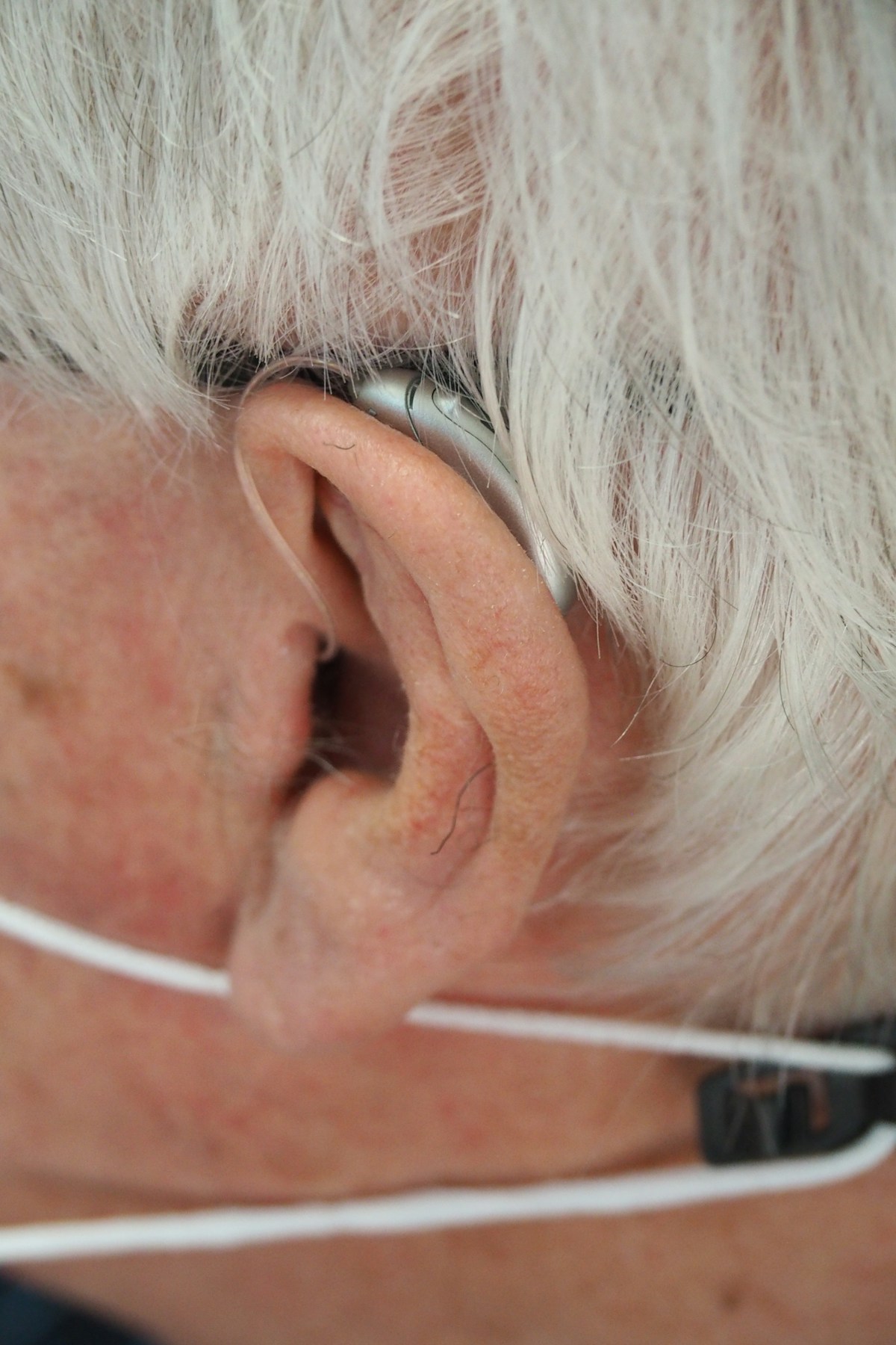 A hearing aid illustrating the hearing-loss research paper